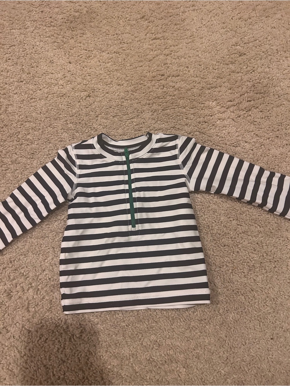 Primary Black & White Striped Long-Sleeve swim top with Green Zip